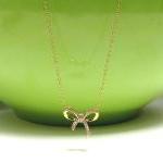 Adorable Infinity Bow Necklace In 14 Kt Gold Over..